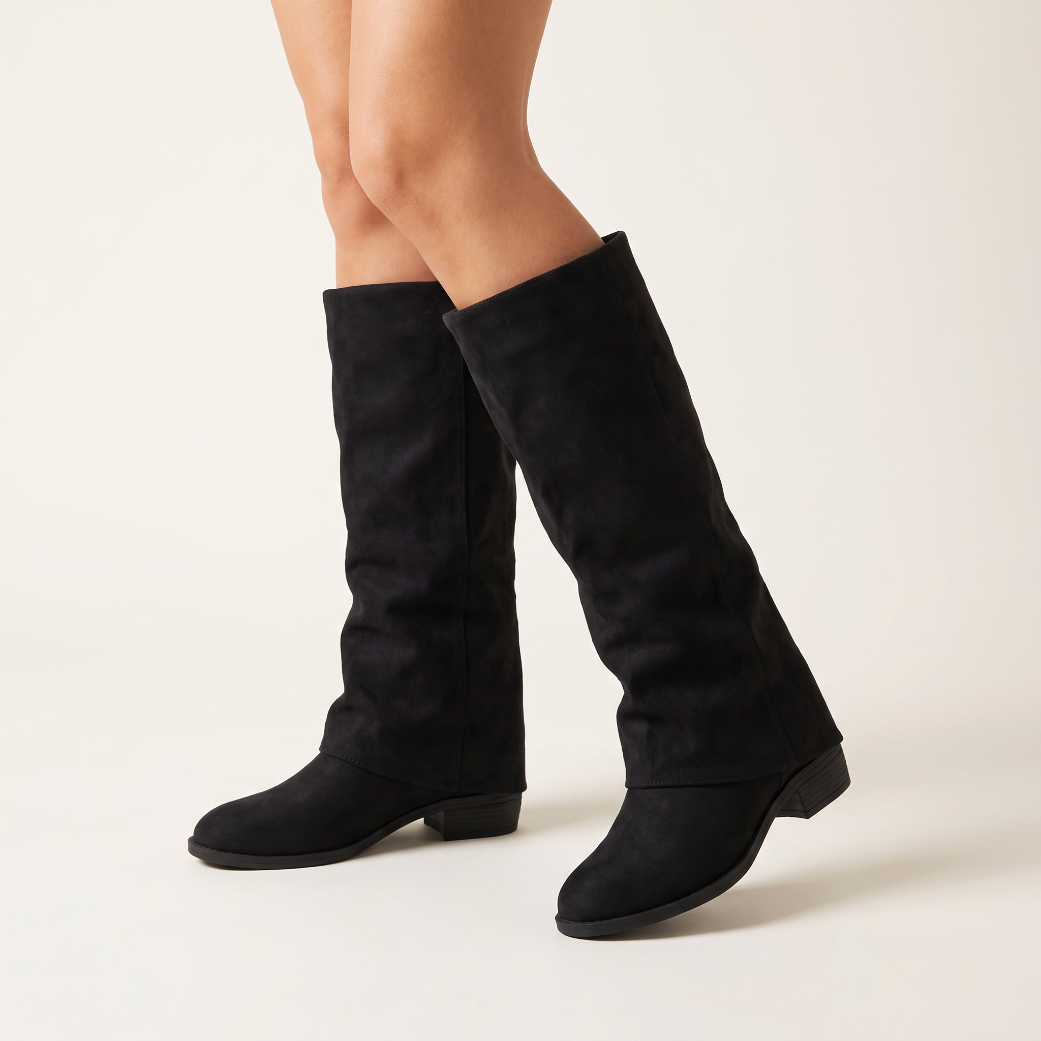 Suede knee high boots worn, side view